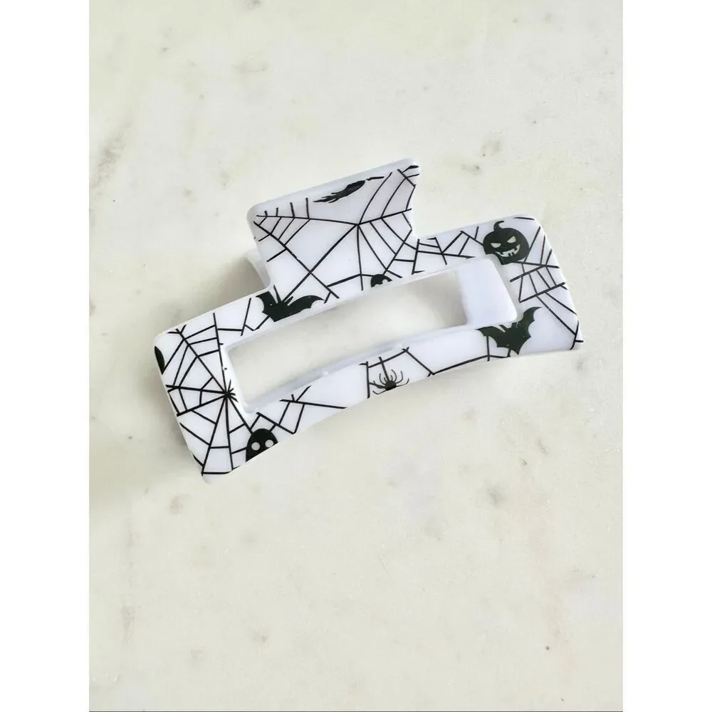 Black and white spiderweb & bat hair claw